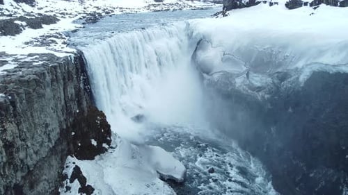 Dettifoss Waterfall in Iceland Frozen Winter Landscape with Snow and Ice Aerial View