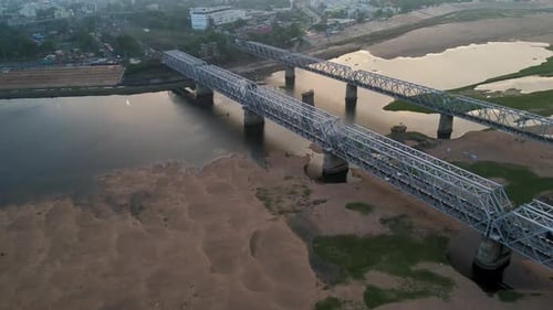 Aerial drone shot of Vijayawada city, featuring a sunrise view