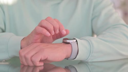 Close up of Man using Smart Watch