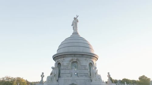 Aerial view of a tomb in a cemetery at sunrise