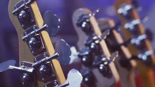 Electric guitar headstock close up details of a string instrument neck