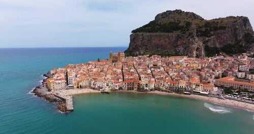 Cefalu, Sicilian Coastal Town in Italy - Aerial Boom Shot