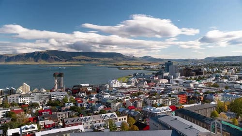 Time lapse of downtown Reykjavik, Iceland, with modern colorful buildings along the coast