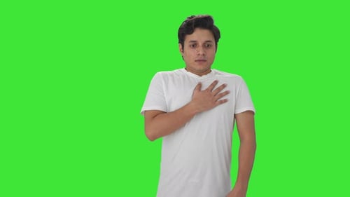 Sick Indian man having an Asthma attack Green screen