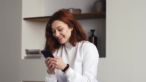 Portrait of Happy Business Woman Enjoy Success on Mobile Phone at Home or Office Closeup Joyful Girl