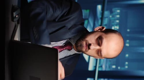 Vertical Video Male Infrastructure Engineer Working in Render Farm