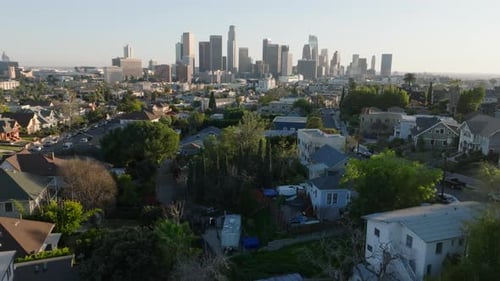 Forwards Fly Above Houses in Urban Borough Group of Downtown Skyscrapers in Financial District in