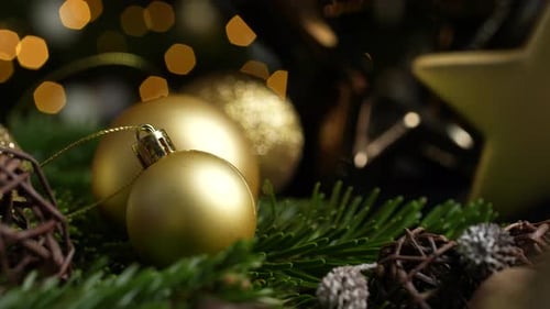 Gold Christmas Ornaments and Pine Needles
