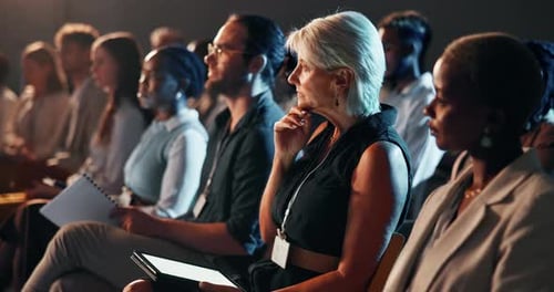 Corporate, conference and mature woman with tablet for workshop, company training and learning