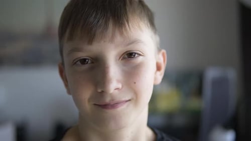 Boy Smiling in a Close Up Portrait