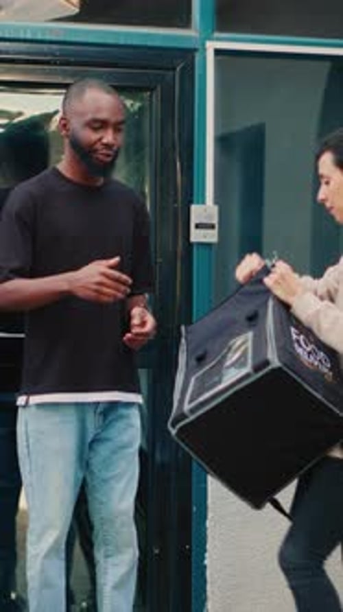 Vertical Video African American Client Saying Its Not My Order to Courier