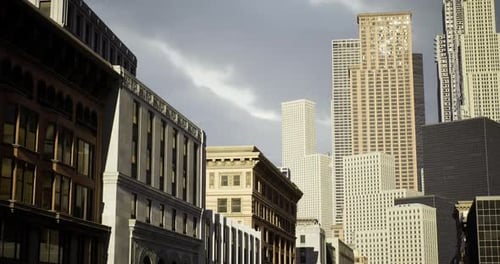 Modern Skyscrapers Rise Above Historic Buildings in Urban Landscape