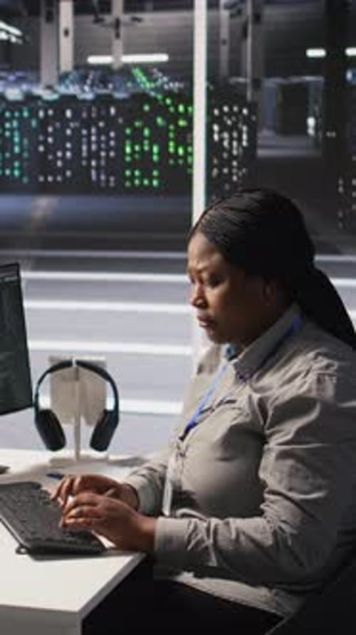 Vertical Video Data Center System Administrator Using PC to Monitor Neural Networks