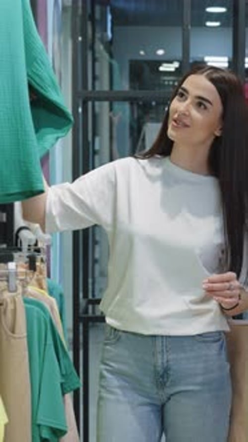 Vertical Screen Female Customer Doing Shopping Together at Fashion Store