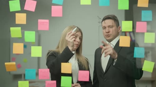 Portrait of Corporate Leader in Office Planning Project on Notes Business Woman and Man Write on