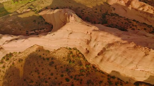 Beautiful rock formations with rounded sides from air erosion. Drone footage over the amazing canyon