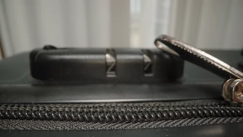 Connecting Zipper Pulls to Suitcase Combination Lock