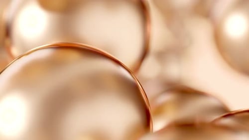 Golden Cosmetic Beauty Care Essential Oil Bubbles Macro Close-Up