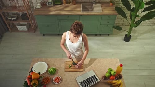 Young Woman at the Table in the Kitchen Preparing Spring Rolls for Healthy Lunch Top View Woman