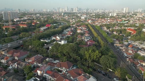 Bintaro Intersection Motorway And Railway Line At Sunset Jakarta City Indonesia Drone Track In