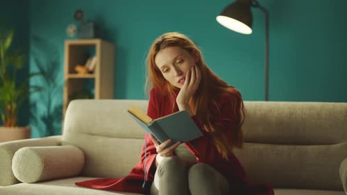 Beautiful woman reading a book
