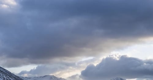 Timelapse of Epic Clouds at Mountain Medow at Autumn Time Wild Endless Nature with Snow Storm Sky