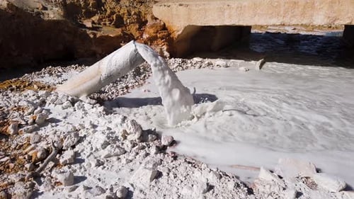 Acid mine water drainage flow, toxic mine waters polluting the environment