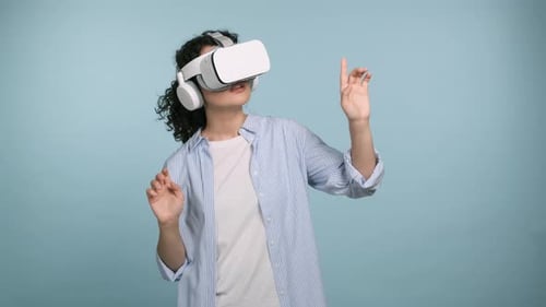 Young Woman Using Virtual Reality Headset