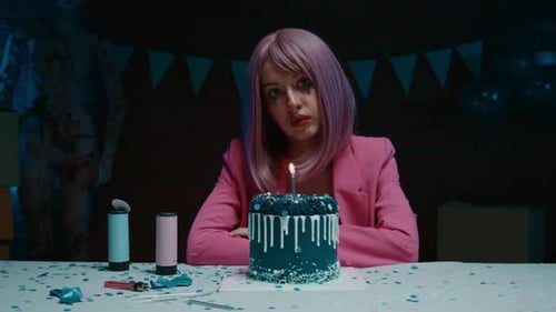 Sad Woman Sits Alone With Birthday Cake