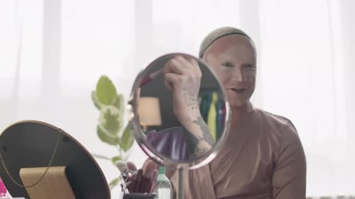 Queer Men Talking while Doing Make Up before Drag Show