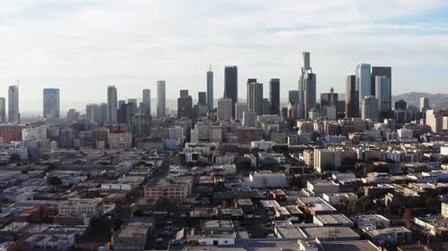 Aerial wide fast flying shot towards Downtown Los Angeles in 2020. 4K