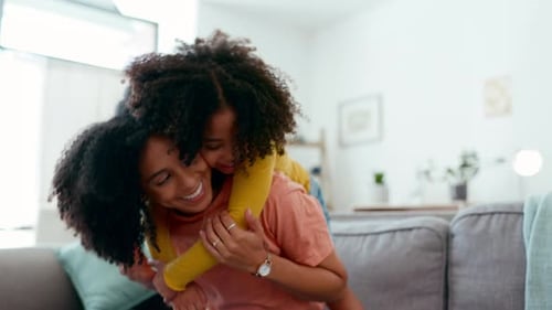 Woman Giving Piggyback Ride to a Child
