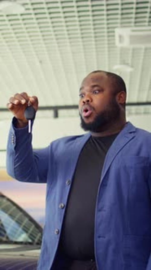 Vertical Video Happy Customer in Car Dealership Excited After Taking Advantage of Sale Offer