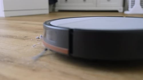 Robotic Vacuum Cleaner Cleaning Wood Floor