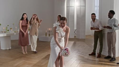 Elegant Bride Throwing Bouquet
