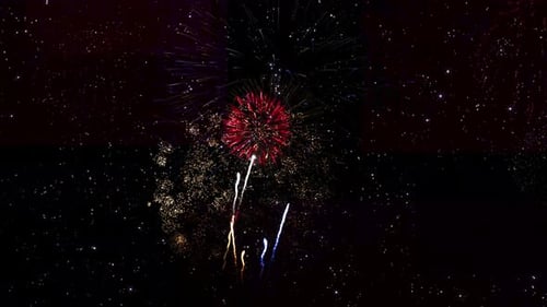 Beautiful Red Fireworks Explosion on Smoke Black Sky
