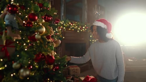Woman Admiring Christmas Tree on Winter Holiday