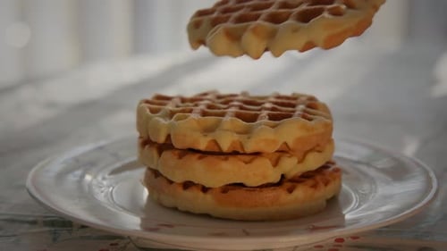 Fresh Waffles Stacked on a Plate