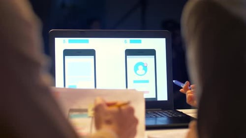 Mobile application design discussion, laptop screen display