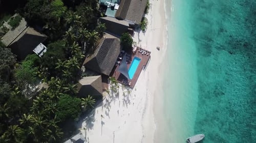 Serenity island exotic paradise resort destination, bird view flying over top of tourist boat on tur