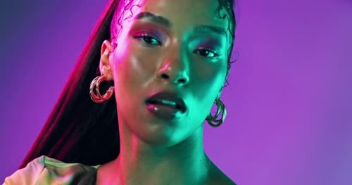 Face, makeup and woman with beauty, neon and dermatology on purple studio background