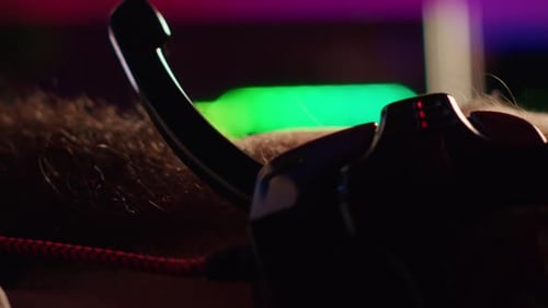 Vertical Video Gamer Battling Enemies in Multiplayer Shooter Discussing with Other Players Through