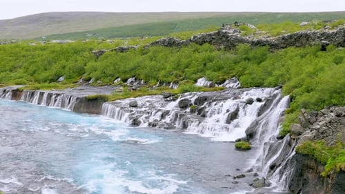 Stunning Lava Waterfall Side View in West Iceland Summer.