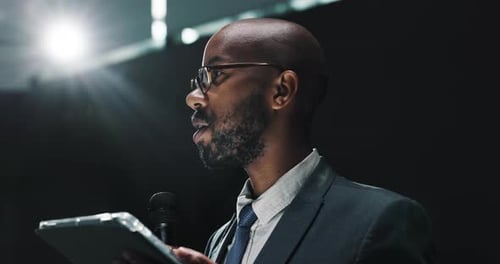 Man Giving Speech at Corporate Conference