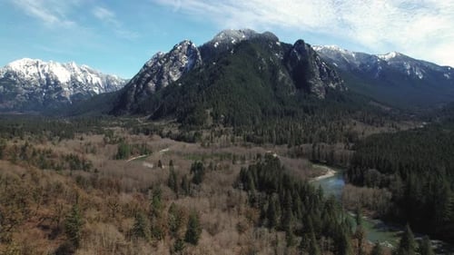 Nature Background With Drone Flight Backwards In Mountain Valley