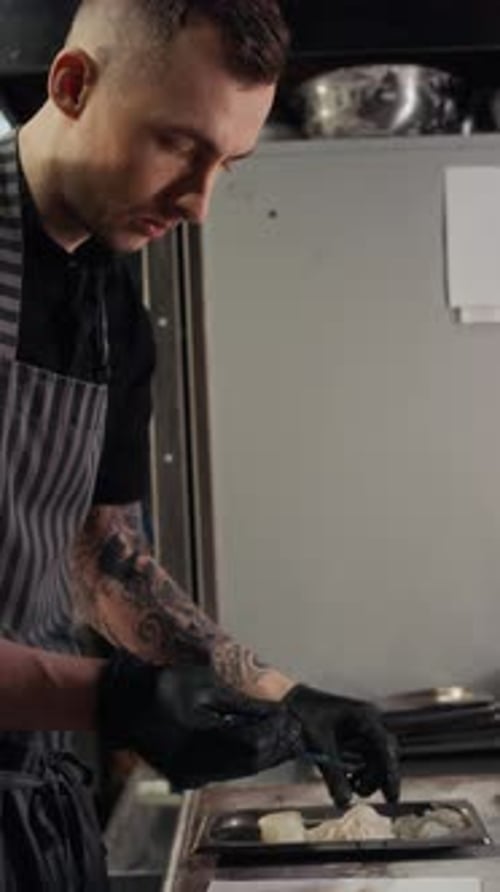 Chef Choosing Seafood Meat For Cooking in Kitchen