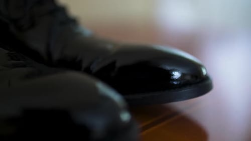 Polished Black Leather Dress Shoe CloseUp