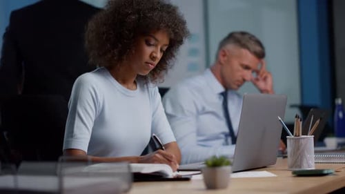Mixed Race Business Woman Working in Open Space. Focused Female Professional Making