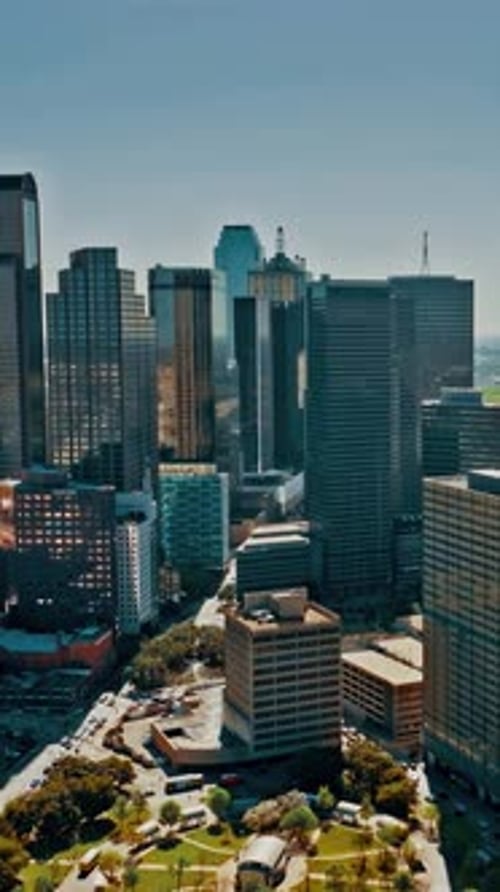 Aerial view of downtown Dallas showcasing skyscrapers and urban layout