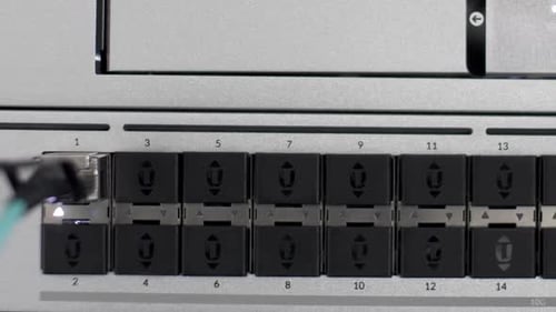 Dolly Right View Across View Of Empty Ports On Server Rack. Macro Shot